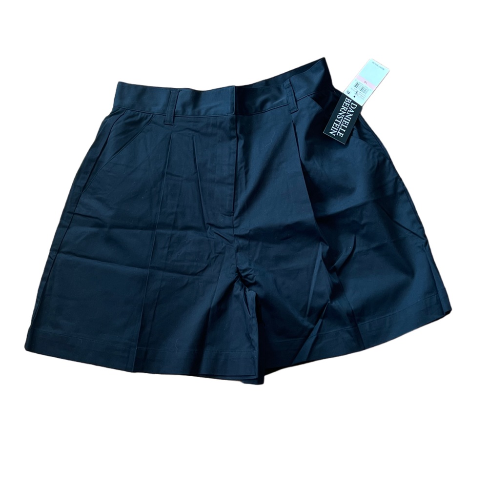 Danielle Bernstein high waisted black pleated shorts